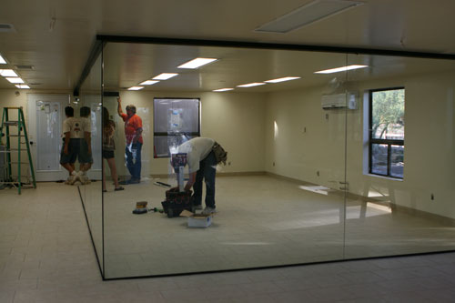 The classroom/venom room is a floor to ceiling glass enclosure.