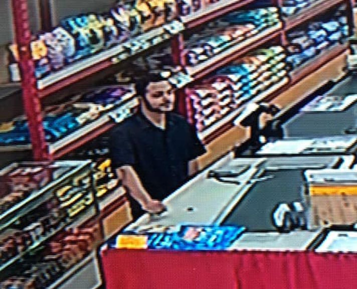 Surveillance Footage Shows Man Taking Ball Python From Michigan Pet Store